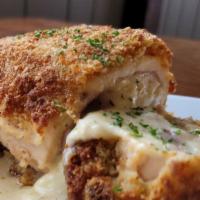Chicken Parmesan · Sautéed, Baked With Marinara, Smothered with Golden Mozzarella Cheese.