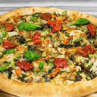 Pesto Veggie · Sarpino's traditional pan pizza baked to perfection, topped with a layer of homemade garlic ...