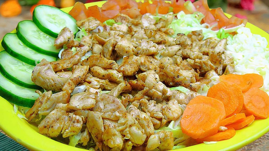 Chicken Or Shrimp Salad · Lettuce, grilled chicken or shrimp, carrots, tomato, and cheese.