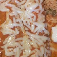 Enchiladas Dinner · Choose your sauce: red, green, suiza, oaxaca or mole. Three rolled tortillas with your choic...