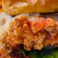 Nashville Fried Chicken Sandwich · Fried chicken thighs, pickles, coleslaw, Sriracha mayo, American cheese, golden brioche