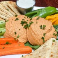 Hummus · Carrots, cucumber, celery, bell peppers and pita bread.