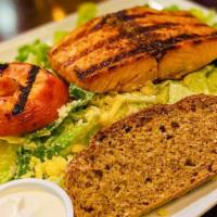 Caesar Salad · Romaine lettuce, shaved Parmesan and house-made croutons.