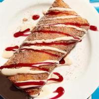 Cheesecake Chimi · FLOUR TORTILLA, CHEESECAKE, CINNAMON, RASPBERRY PUREE