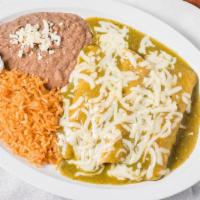 Enchiladas (Arroz Y Frijoles)  · 2 Rolled tortillas red with ground beef, chicken steak with a mild pepper sauce and melted c...