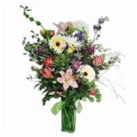 Sweetness & Love Bouquet · A summertime mixture of lilies with blue delphinium and white accents in a green cube vase. ...
