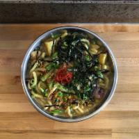 Yaki Butter Udon · pan-fried • market greens • beech mushrooms • crispy garlic • sesame-butter sauce