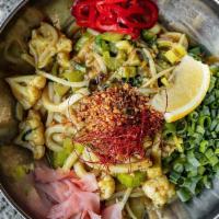 Curry Yaki Udon · pan-fried udon, silky curry sauce, bean sprouts, cauliflower, celery, pickled ginger, pickle...