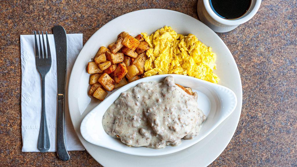Biscuits & Gravy With Eggs · Flaky biscuit halves topped with sausage gravy. Served with two eggs any style and side.