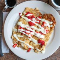 Strawberry Cream Crepes · Sweet cream and fresh strawberry slices stuffed into sweet crepes. Then drizzled with sweet ...