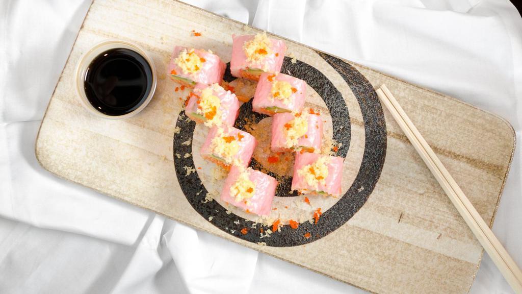 Pink Lady Roll (8) · Avocado, spicy crab stick wrapped w. soybean paper and topped w. crunch and spicy mayo sauce & tobiko.
