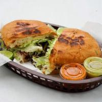 Torta Tripa / Tripe · Seasoned Mexican Tripe Beef

House Favorite