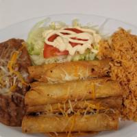 Flatuas  · Fried  Chicken Taquitos topped with Lettuce, Tomato, Sour Cream served with a side of Rice a...