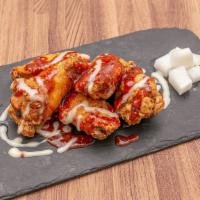 Korean Chicken Wings (6 Pieces)  · Fried chicken wings, side of pickled radish. Choice of Plain, K-spicy, Soy garlic sauce.
