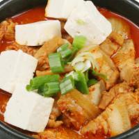 Kimchi-Jjigae · Kimchi and pork, tofu in spicy soup.