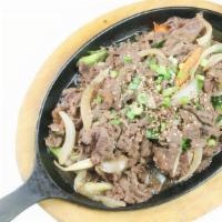 Beef Bulgogi · Thinly sliced marinated beef with vegetables.