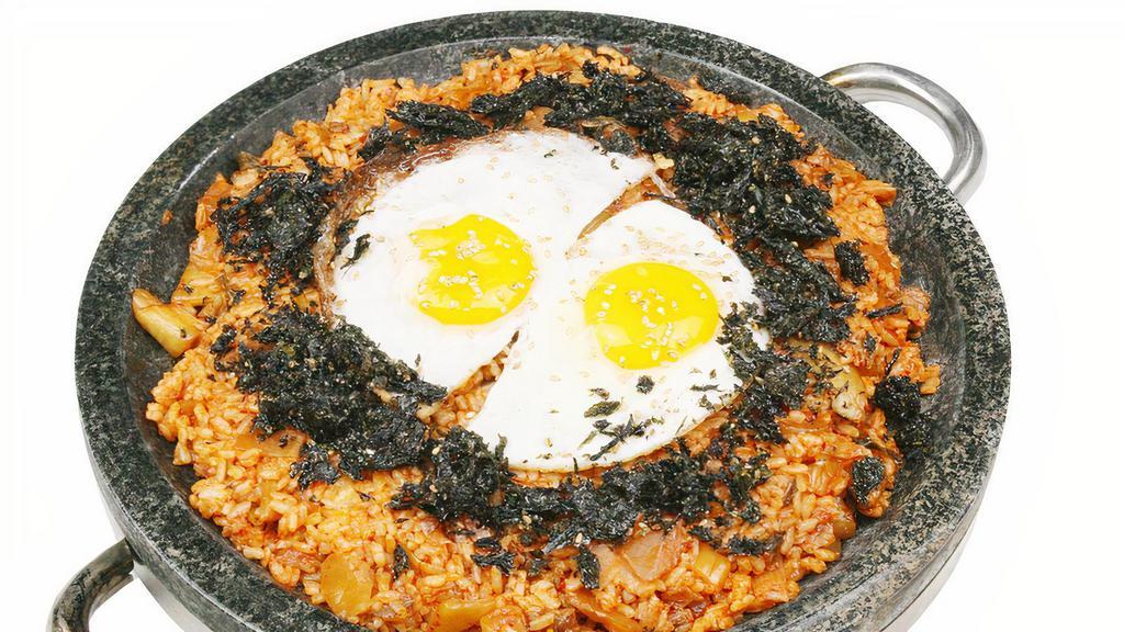 Kimchi Fried Rice · Fried rice with Kimchi and beef, roasted seaweed and a sunny up egg