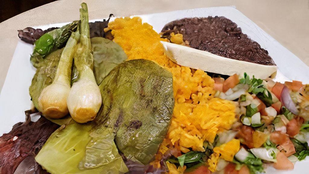 Steak Or Jearky /  Carne Asada O Cecina · Your choice of a cut of marinated sliced steak, or jerky steak, with grilled onions and jalapeños, served with rice, beans, and tortillas.
