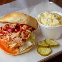 Swanky Chicken Sandwich · Pulled chicken with BBQ mayo, lettuce & tomato on a Kaiser bun.