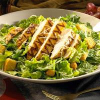 Classic Caesar Salad · Crisp romaine lettuce tossed with our house-made Caesar dressing, shredded Parmesan cheese, ...