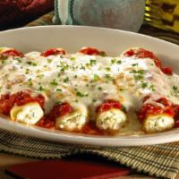 Manicotti · Ricotta and Romano cheeses stuffed in pasta shells, then layered with both tomato and Alfred...