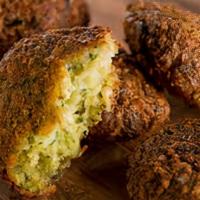 Falafel · Six pieces garbanzo beans with parsley, cilantro, onion, garlic, and spices deep fried, serv...