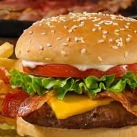 Cheeseburger (Combo) · Combos served with fries and can pop. Cheese, lettuce, tomato, onion, ketchup, mustard, pick...