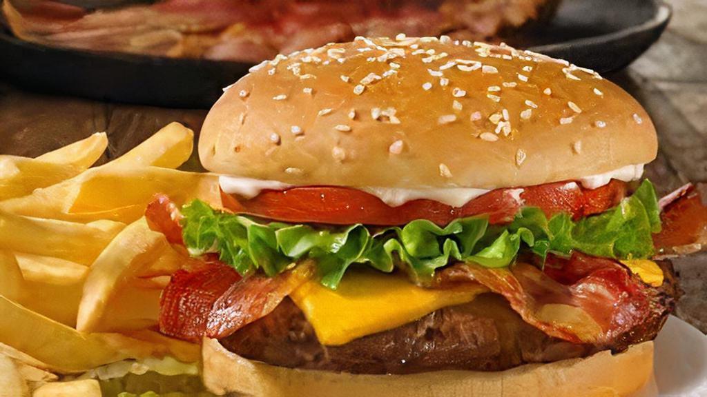 Cheeseburger (Combo) · Combos served with fries and can pop. Cheese, lettuce, tomato, onion, ketchup, mustard, pickles and mayo.
