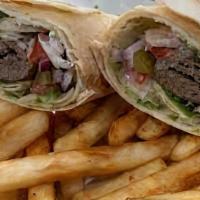 Kabab Sandwich · Kufta or chicken kabab stuffed in a pita pocket with lettuce, tomato, cucumber and tahini sa...