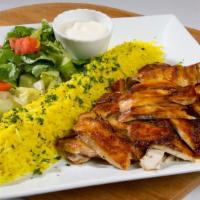 Shawarma Plate · Thin slices of marinated chicken or steak, cooked on a slow revolving rotisserie. Served wit...