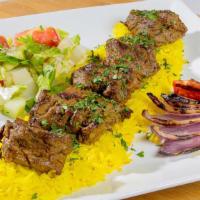 Lamb Kabab · Fresh tender cut marinated lamb grilled, served with rice and house salad.