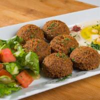 Falafel Plate · Six pieces of falafel, hummus, house salad, served with tahini sauce and pita bread.