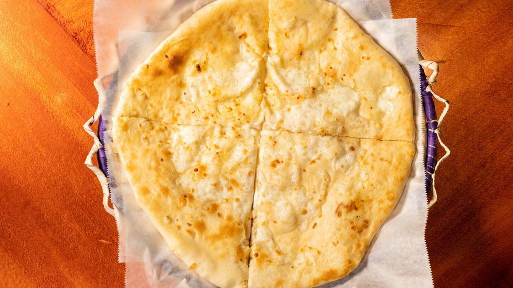Cheese Naan · Favorite. A tandoor made bread stuffed with cheese.