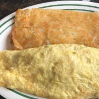 Western Omelette Breakfast · Green peppers, onions, ham and cheese.