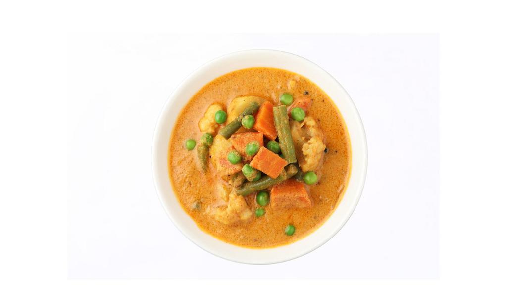 Navratan Korma · Mixed veggies cooked with onion, garlic, tomatoes, cream, nuts and spices.