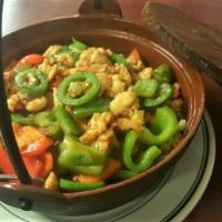 Firecracker Chicken / 辣爆鸡 · Spicy. Slices of white meat chicken stir fry with jalapeño, green and red peppers in spicy s...