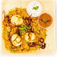 Egg Biryani · Authentic hyderabadi dum biryani cooked w/eggs, spices, premium basmathi rice, garnished w/ ...