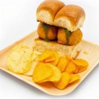 Vada Pav · Spicy potato filling served with toasted pav bread and garnished with mint sauce and spicy g...