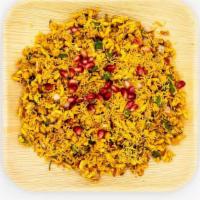 Bhel Puri · Savoury snack made with puffed rice, vegetables, mint sauce and a tangy tamarind sauce