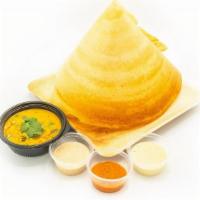 Onion Dosa · Fermented spicy crepe or rice cake made w/ rice & lentil batter, chopped onions & served w/ ...