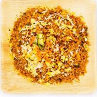 Egg Schezwan Fried Rice · Fried rice made w/ extra long grain basmathi rice sauteed w/ carrots, beans, eggs, chef's sp...