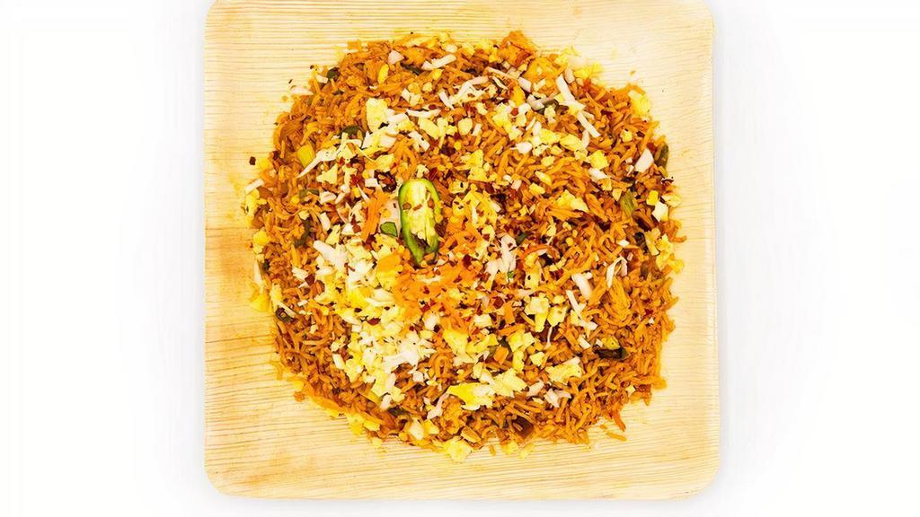 Egg Schezwan Fried Rice · Fried rice made w/ extra long grain basmathi rice sauteed w/ carrots, beans, eggs, chef's special schezwan sauce & flavored w/ spices.