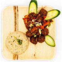 Chilli Veg · Spiced & battered Veg Balls cooked w/ capsicum, onion & special chilli sauce, topped w/ shre...