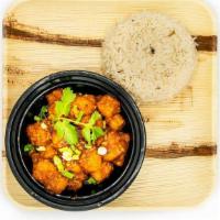 Paneer Manchurian · Spiced & battered cheese pieces cooked w/ authentic manchurian sauce, topped w/ shreds of gi...
