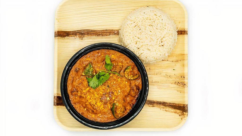 Chicken Kadahi · Delicious, spicy & flavorful dish made with chicken, onions, tomatoes, ginger, garlic & fresh ground spices