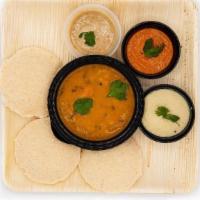 Idli · Steamed rice cakes served w/ rich mixed vegetable soup (sambhar) and chutneys