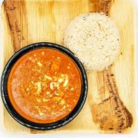 Paneer Butter Masala · Soft Cheese cubes cooked in a spicy gravy and topped with butter