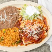 Enchiladas W/Meat · 3 Rolled corn tortillas stuffed with your choice of meat and topped with chihuahua cheese. C...