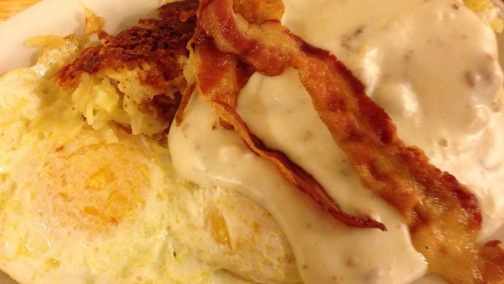 Hungry Man Special · Half order biscuits and gravy with (2) eggs and (2) bacon or (2) sausage links or (1) patty, served with hash browns.