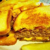 Frisco Melt · Beef patty on grilled rye with american cheese, applewood bacon and thousand island dressing.